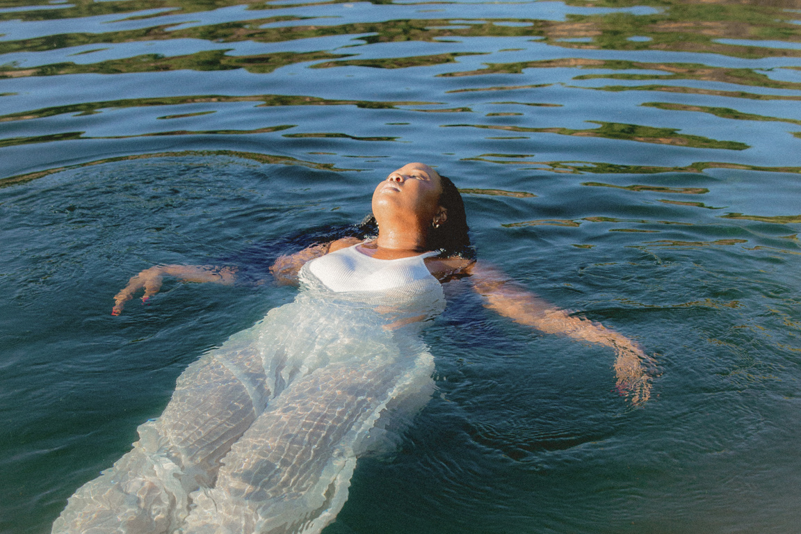 Calming Water Woman Floating in Water